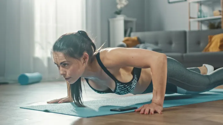 Women doing push ups to strengthen arms