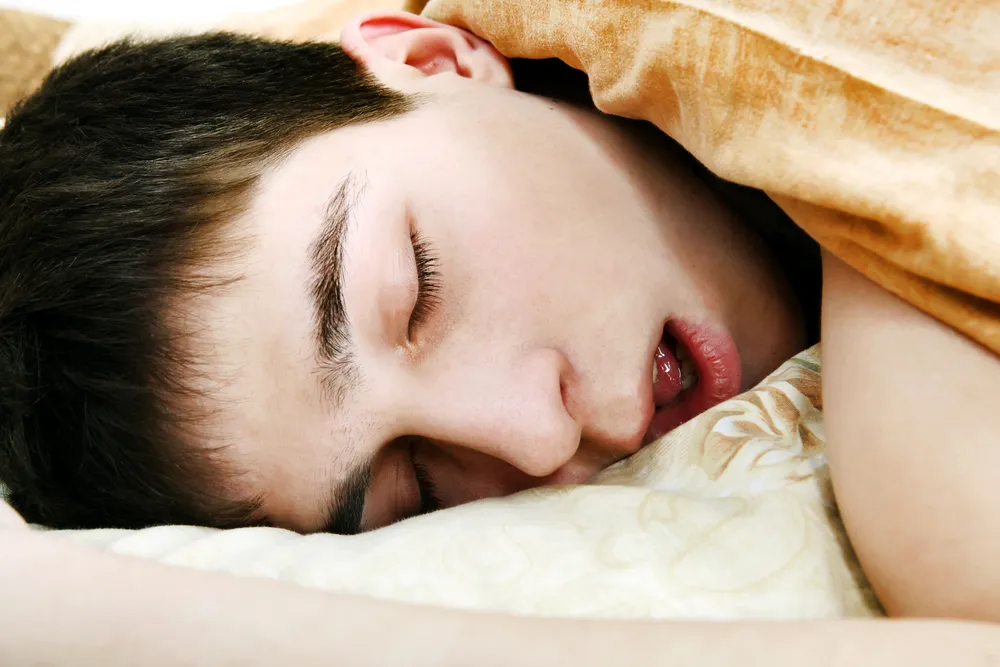 Is sleeping on your stomach bad: Health concerns for stomach sleepers