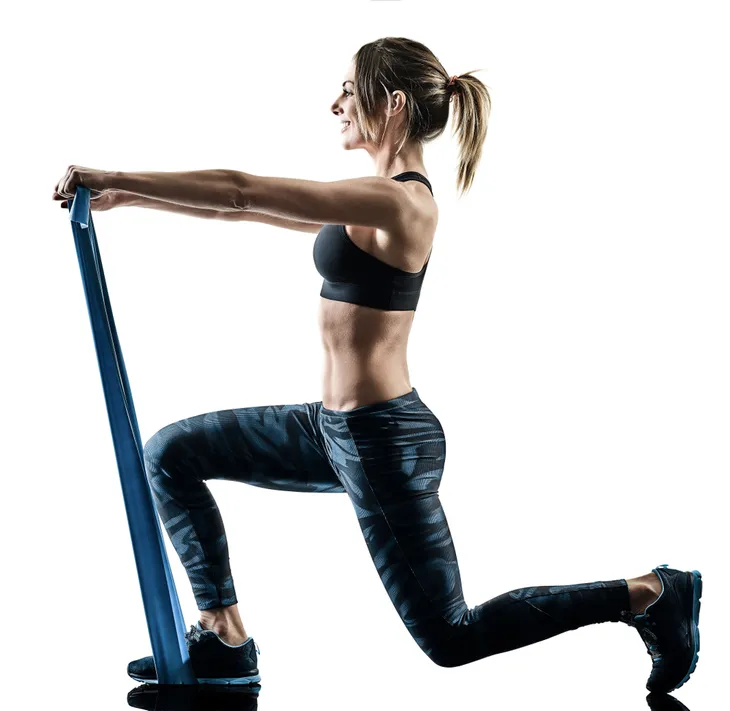 Woman using resistance bands