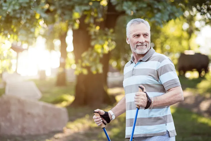 Man walking with poles