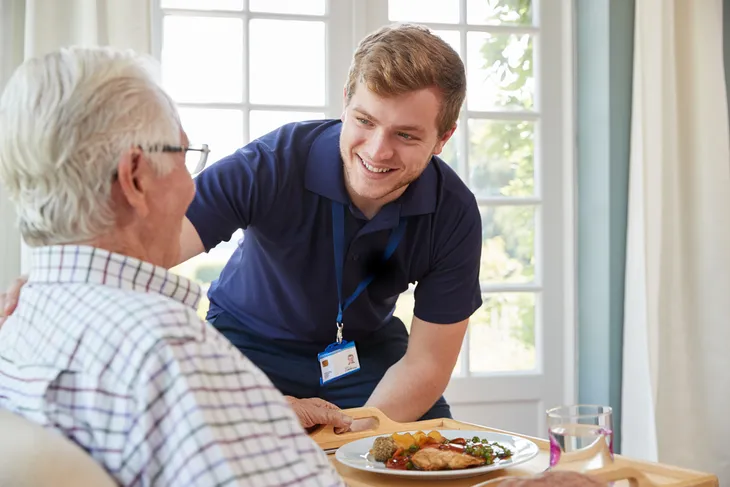 senior and home care provider talking 