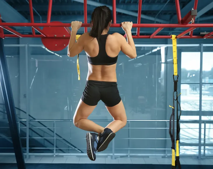 Woman Doing Pull Ups