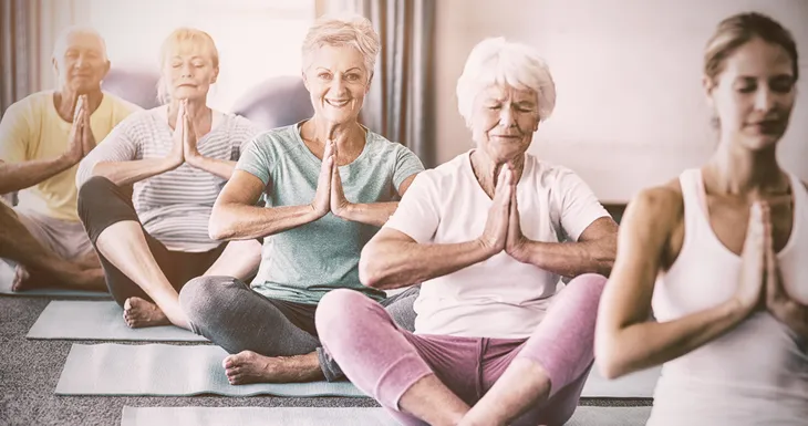 seniors doing yoga