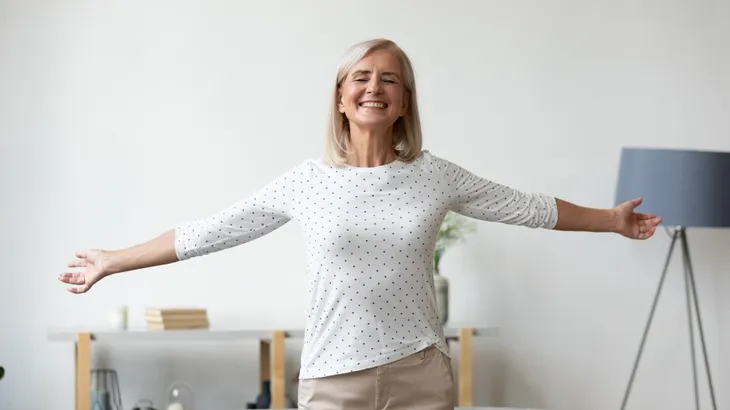 senior woman stretching chest