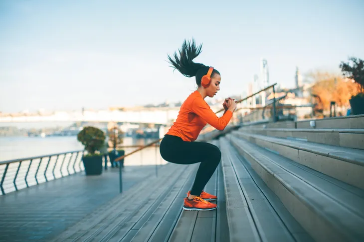 woman working out on stairs