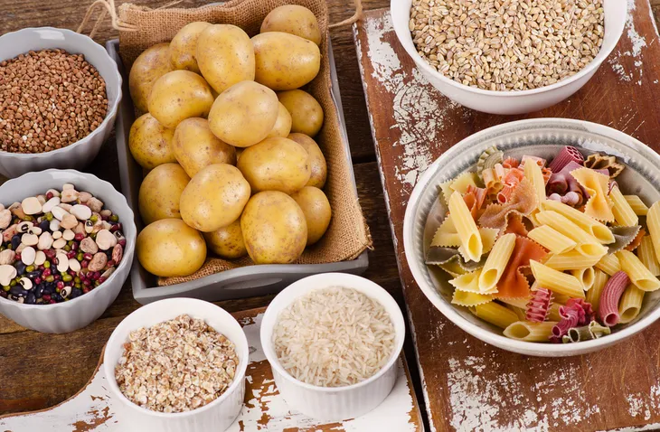 variety of carbs including potatoes, pasta, rice, grains, and beans.