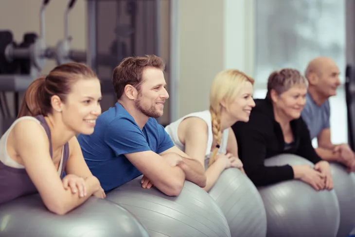 Group exercising together on stability balls