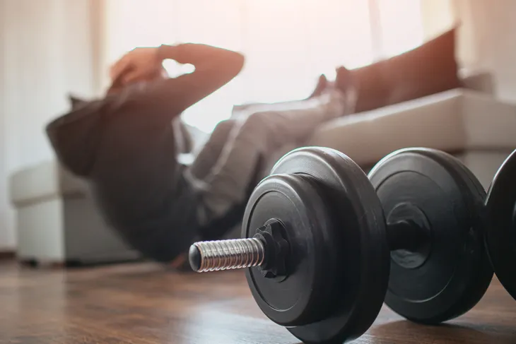 Man doing superset exercises